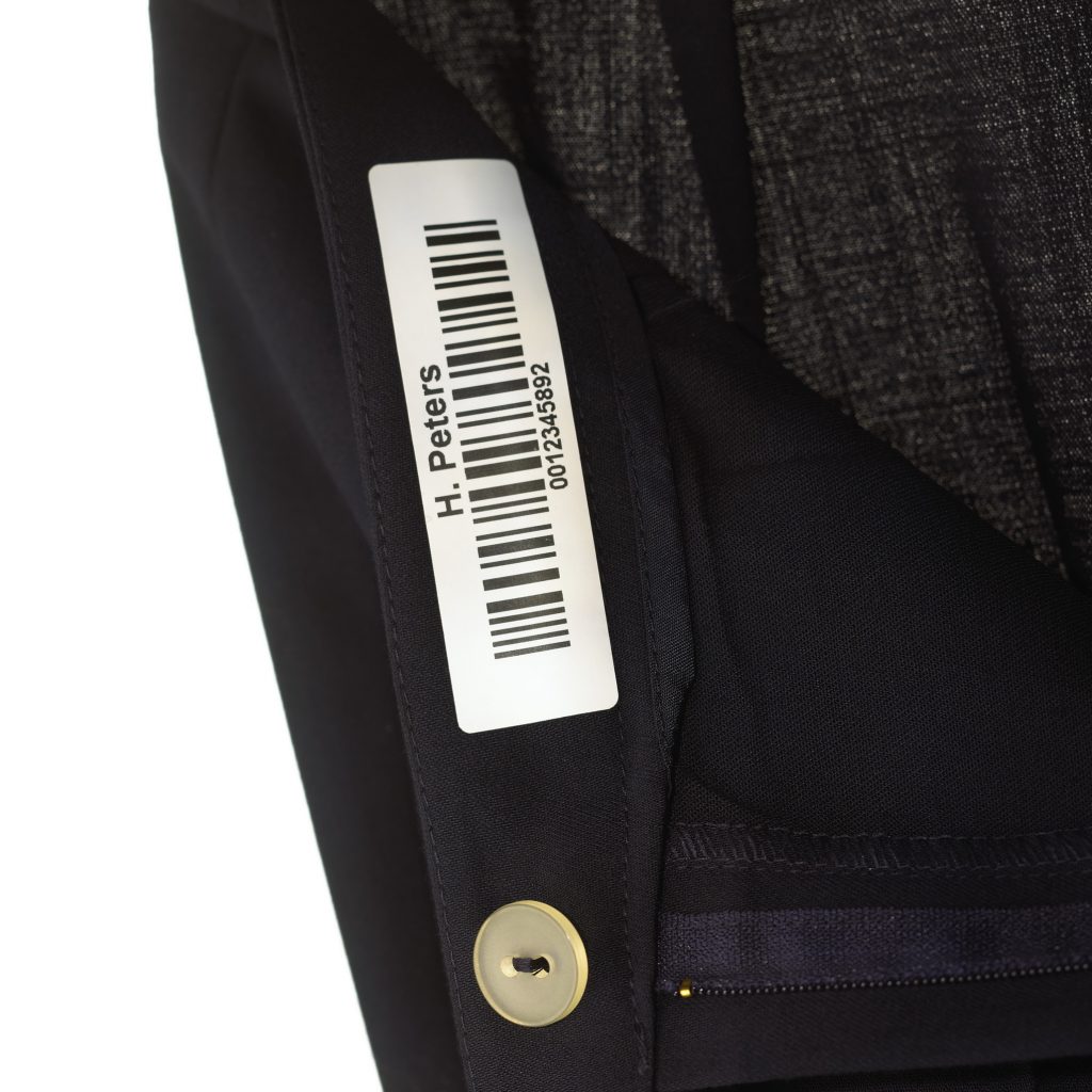 permanent tagging of labels to uniform